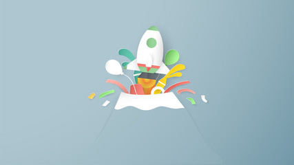Vector illustration with start up concept in paper cut, craft and origami style. Rocket is flying. Template design for web banner, poster, cover, advertisement. It's art craft for kids.