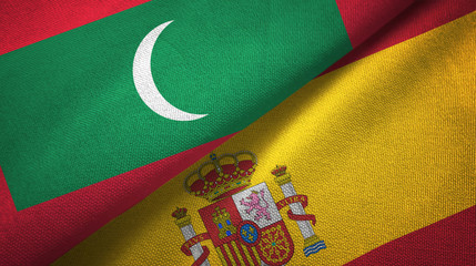 Fototapeta premium Maldives and Spain two flags textile cloth, fabric texture