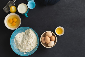 Baking ingredients cooking homemade muffins or lemon cookies. Bakery background top view