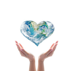 Green planet in heart shape over woman human hands isolated on white background.