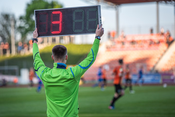 Custom blinds with your photo Technical referee shows 3 minutes added time during the football match.