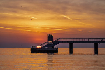 Fototapeta na wymiar Burgas Bridge at sunrise. The Bridge is the symbol of the city. 