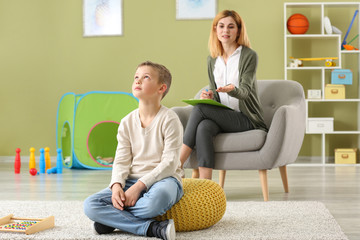 Little boy with autistic disorder at child psychologist's office