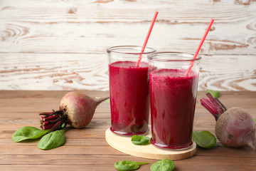 Glasses of fresh beet smoothie on table