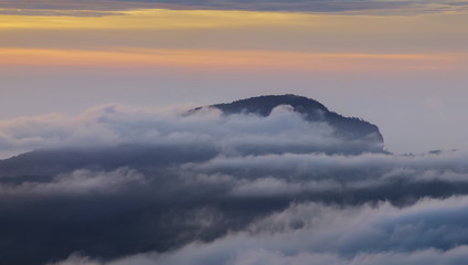 Panorama view sunrise at Doi Inthanon, mountain view morning of peak mountain Doi Hua Suea around with sea of fog with cloudy sky background, KM.41 view point Doi Inthanon, Chiang Mai, Thailand.