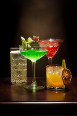 Various cocktails on a light and dark background