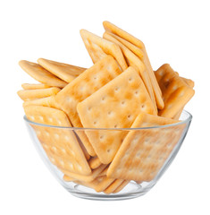 Crispy square cracker in a bowl isolated on white background
