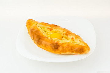 ajarian khachapuri in plate isolated on white