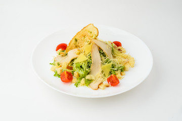 caesar salad in plate isolated on white