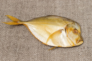 Smoked Atlantic moonfish on a burlap