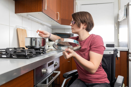 disabled woman cooking in the kitchen