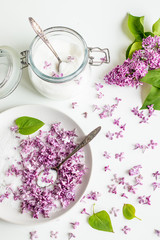 Homemade preparing of lilac sugar with amazing fragrance
