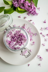 Obraz na płótnie Canvas Homemade preparing of lilac sugar with amazing fragrance