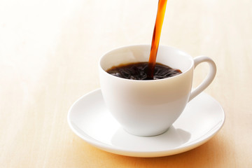 コーヒー　Coffee cup on wooden background