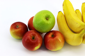 Five apples and four bananas lie on a white background