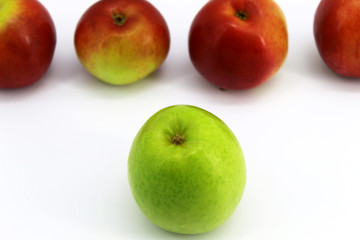 Green Apple in the foreground. White background