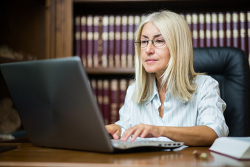 Woman using her laptop computer