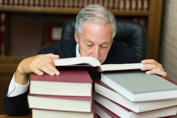 Lawyer reading boring books