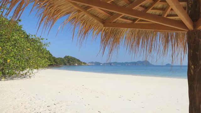 leaf umbrella on tropical white sand beach, Nyaung Oo Phee, Myanmar, Lockdown.