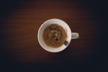 cofee mug on brown table