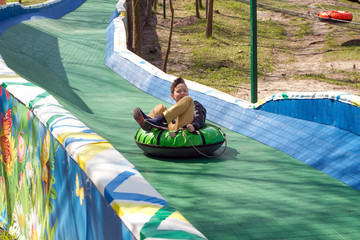 Happy boy with tube