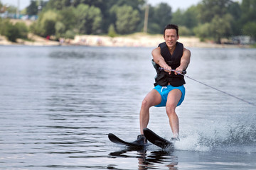 Man riding water skis