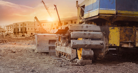 Construction equipment in construction new building background, excavator with crane on...