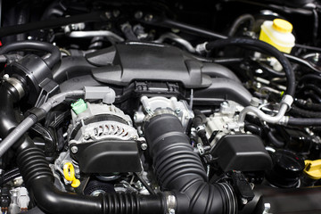 Obraz na płótnie Canvas Detail of engine of car. (electric car)
