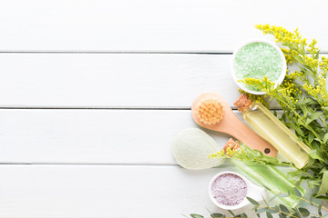 Plakat Beauty and aromatherapy concept with spa set on pastel rustic wooden background.