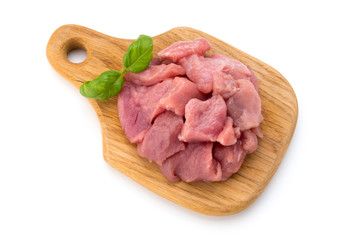Raw chopped beef meat pieces isolated om white background cut out.
