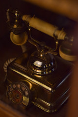 Fototapeta na wymiar vintage telephone in wardrobe