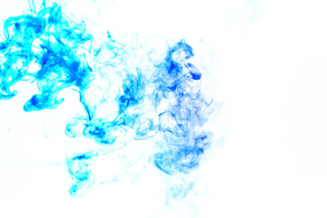 Colorful steam exhaled from the vape with a smooth transition of color molecules from turquoise to blue on a white background like a collision of two jets of smoke. Malicious virus and drug injection.