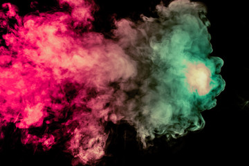 Obraz na płótnie Canvas Beautiful column of smoke in the neon bright light of red, green, pink and turquoise on a black background exhaled out of the vape. Nice pattern for printing and backdrop of colored waves.