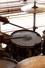 Fototapeta na wymiar Drummer practicing rudiments on snare drum.