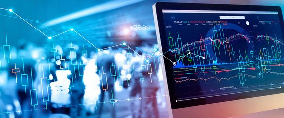 Financial data on a monitor. Investing and stock market gain and profits with graph charts, diagrams, growth, financial figures and investor business group on background