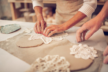 Close up of a white crocheted napkin