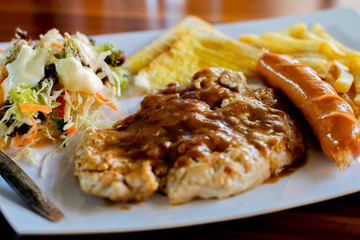 grilled pork steak with french fries