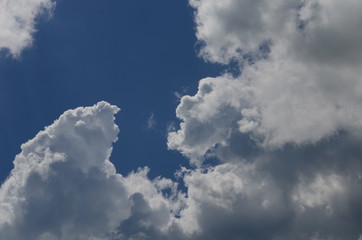 blue sky with beautiful white fluffy clouds