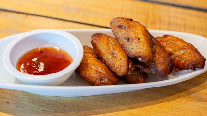 fried chicken wings and sauce