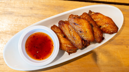 fried chicken wings and sauce