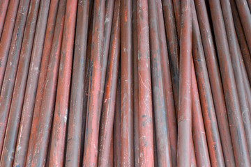 Stack of steel pipes close up