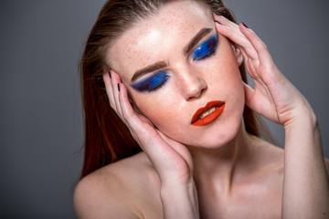 Beautiful sexy woman with bright makeup