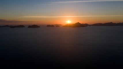 sunset over the sea.Sunset over the sea. Sea pyezhzh with islands during sunset.