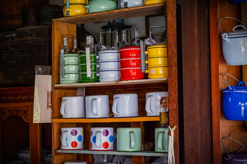 Colorful coffee cups display in local shop at Klong Bangluang market , Bangkok, Thailand