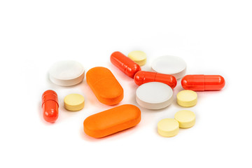 Pile Medical colorful pills isolated on white.
