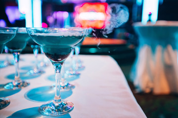 Many glasses of margarita cocktail on the bar. Margarita Cocktail Blue Cocktail