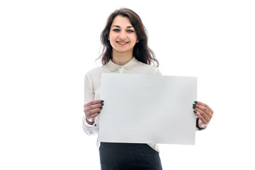 Young woman holding empty sheet of paper isolated