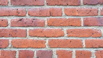Bricks texture. Dark red brick wall. Colorful red and brown brick wall background.