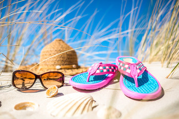 Blue sky and white sand beach with accessories, holiday vacation - summer background