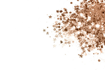 Rose gold glitter and glittering stars on white background in vintage colors